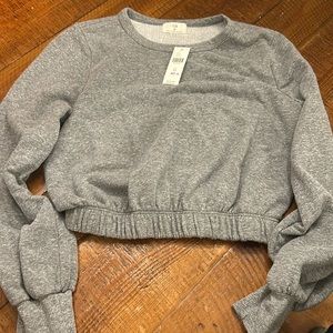 Cute cropped t.la sweatshirt from Anthro NWT